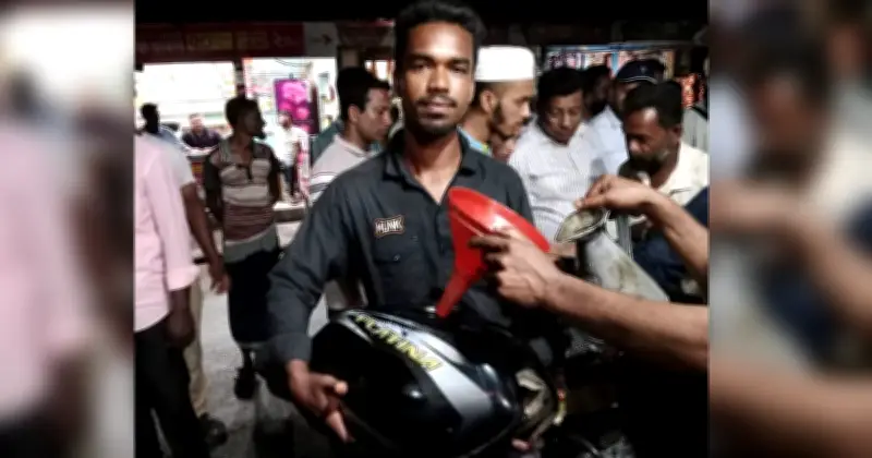 পটুয়াখালীতে তেল সংকট: মোটরসাইকেল ট্যাংক হাতে নিয়ে লাইনে দাঁড়ালেন চালক