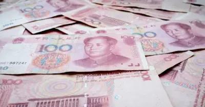 মার্কিন ডলারের বিপরীতে চীনের ইউয়ানের মান কমেছে