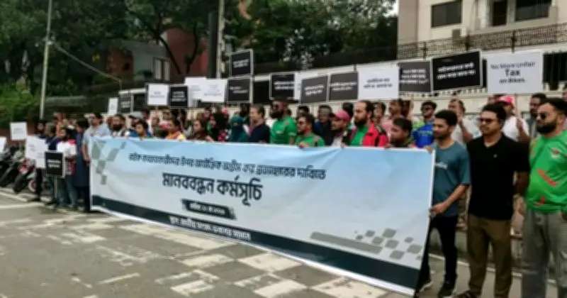 বাইকারদের মানববন্ধন: প্রস্তাবিত আয়কর প্রত্যাহারের দাবি