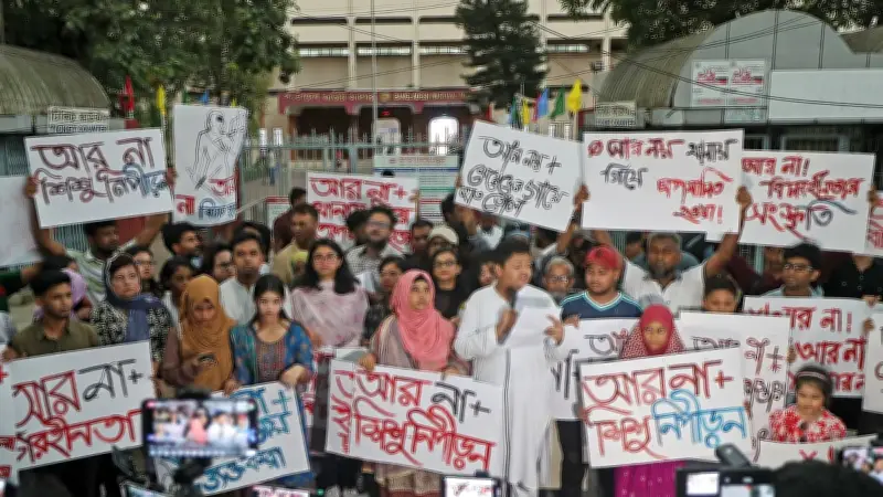 শিশু নির্যাতন ও ধর্ষণের বিরুদ্ধে ‘আর না’ সমাবেশ শাহবাগে