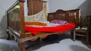 পুঠিয়া রাজবাড়ির পালঙ্ক কিনে ৩৫ বছর ধরে ব্যবহার করছেন মৎস্যচাষি