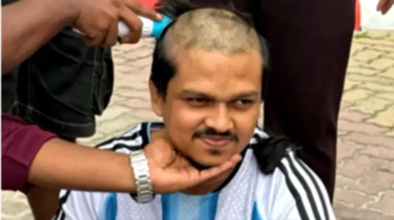 পটুয়াখালীতে আর্জেন্টিনা সমর্থকের মাথা মুড়ানোর ঘটনা
