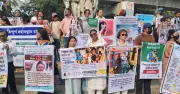 প্রাণীপ্রেমীদের মানববন্ধন: কুকুর হত্যার দাবির প্রতিবাদ